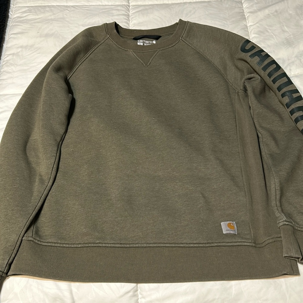 Carhartt sweatshirt size large . Good condition no peeling or holes .